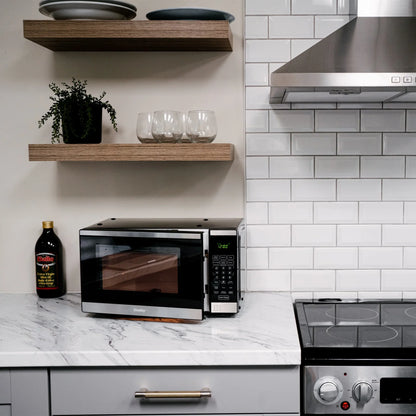 2026 NEW Danby Designer 0.7 cu. ft. Space Saving Under the Cupboard Microwave in Stainless Steel (DDMW007501G1)